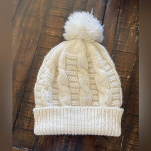 Slouch beanie puffball on top worn once thick net pattern